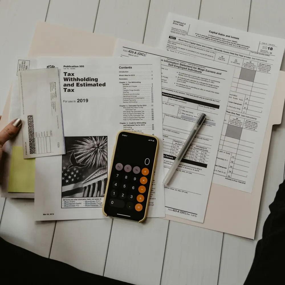 Financial documents and calculator representing banking and institutional security